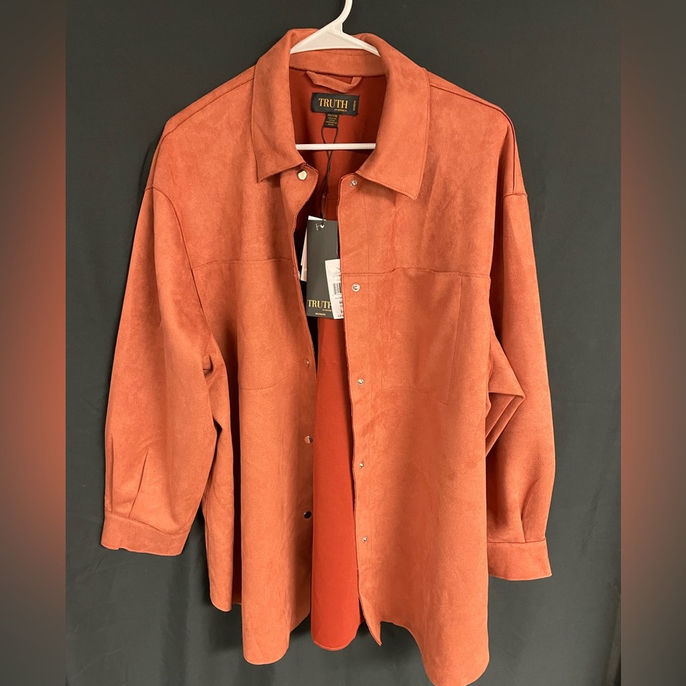 Rust colored faux leather button front shirt. NWT